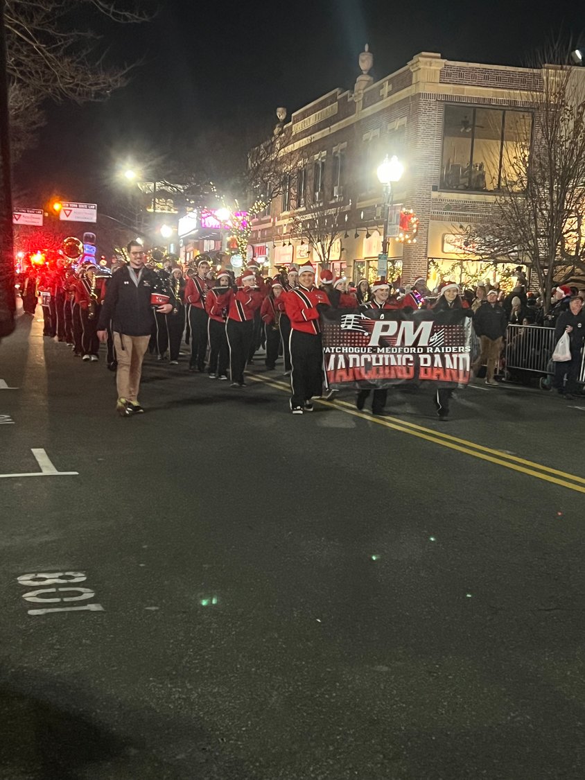The Patchogue-Medford Raiders marching band made a stellar appearance, showing school and holiday spirit during the parade.